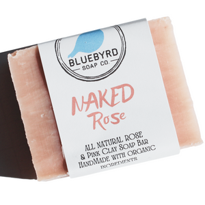 Naked Rose is a natural rose petal scented pink clay soap bar. Beauty queen or not, this Naked Rose Facial & Body Soap Bar makes washing up a bed of roses. Handcrafted and made from 100% natural, 85% organic, and vegan ingredients. MADE WITH NATURAL CLEANSING CLAYS: Kaolin clay 